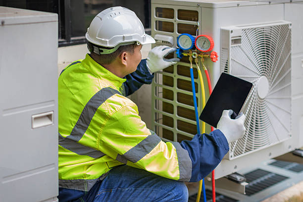 Professional Air Conditioning Repair technician working in Millstadt, IL